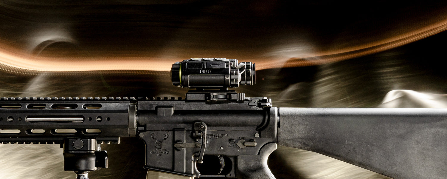 TDX Dominator Thermal Sight atop an AR platform at night