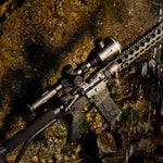 Thermal Dynamix Praedator rifle sight atop an AR-15 in inclement weather