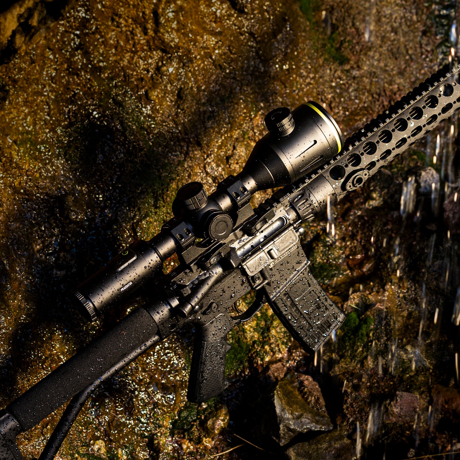 Thermal Dynamix Praedator rifle sight atop an AR-15 in inclement weather